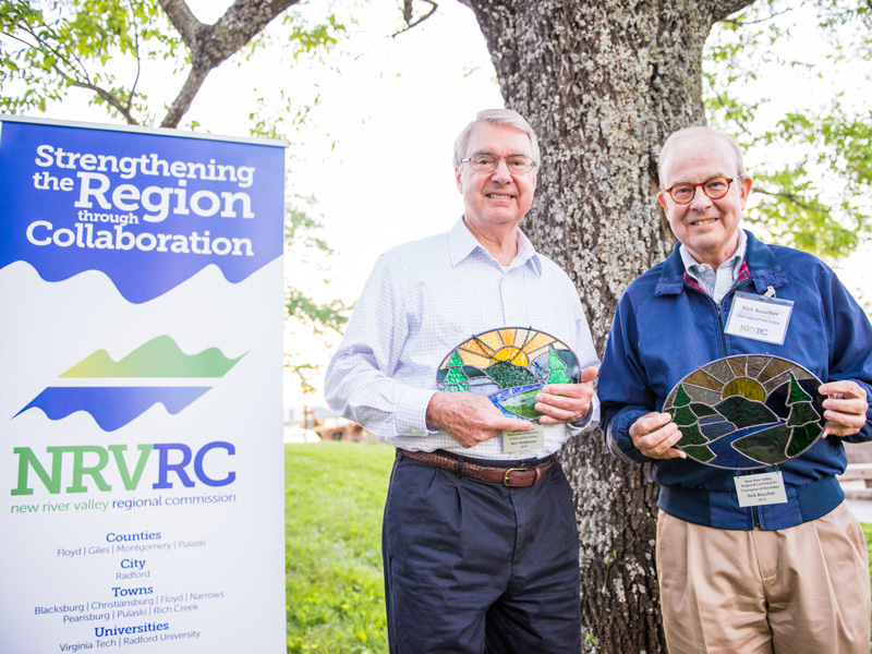 Award winners pose next to NRVRC sign